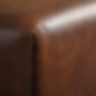 Close-up view of a leather sofa scratch.