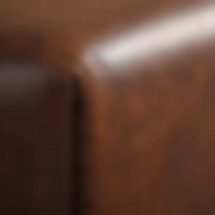 Close-up view of a leather sofa scratch.