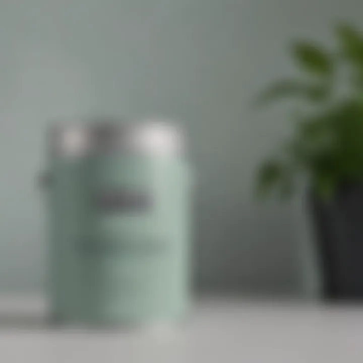 Close-up of a paint can featuring Behr's Colour of the Year 2022, highlighting its rich and calming tones.