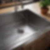 A close-up view of a stainless steel kitchen sink highlighting its sleek design