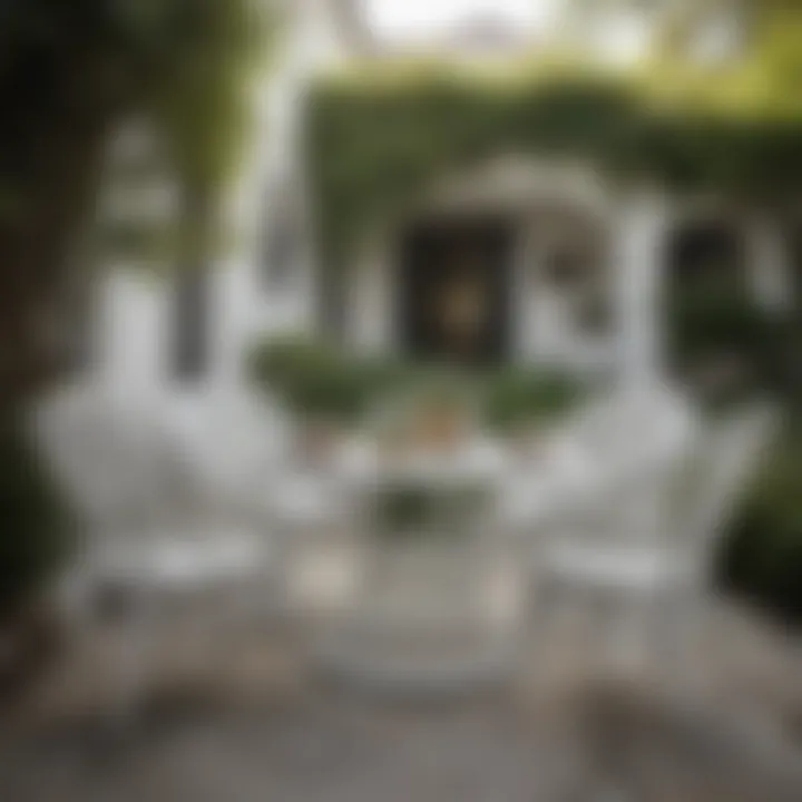 Stylish white wicker chairs arranged around an outdoor dining table