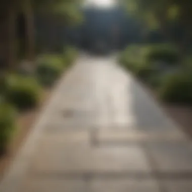 Modern stone pathway leading to an elegant pool area