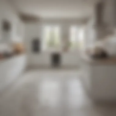 Modern kitchen layout showcasing the harmony of white cabinets and tile flooring