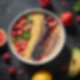 Vitamix blender with smoothie bowl garnished with fresh fruits