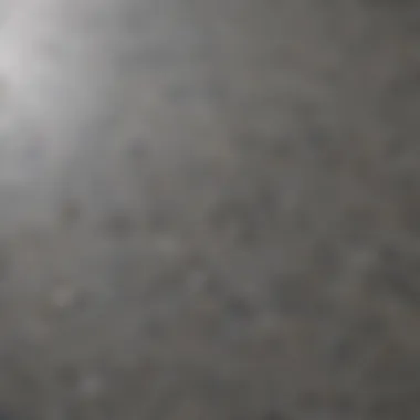 Close-up of a dull granite countertop showing scratches and stains