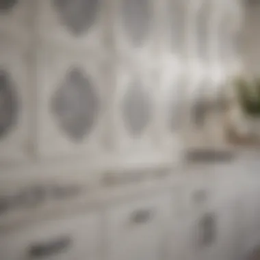 Close-up of white cabinets and intricate tile design