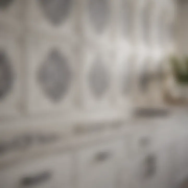 Close-up of white cabinets and intricate tile design
